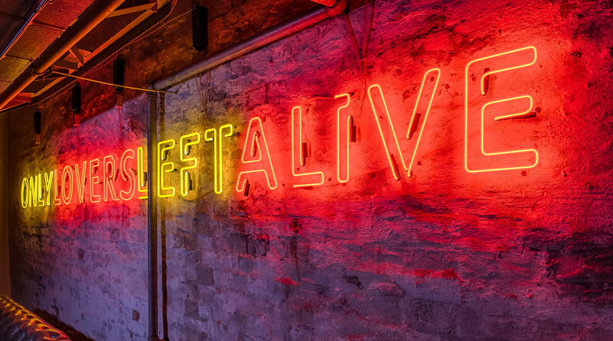 neon-inside-the-building-only-lovers-left-alive-neon-inside-the-building-only-lovers-left-alive-neon-on-the-wall-neon-yellow-red-neon-on-the-wall-with-brick